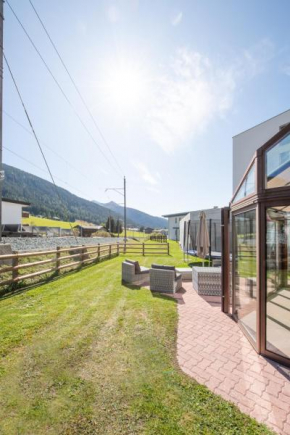 Agrimonia - 5,5-Zi Duplex Wohnung bis 9 Personen mit eigenem Garten